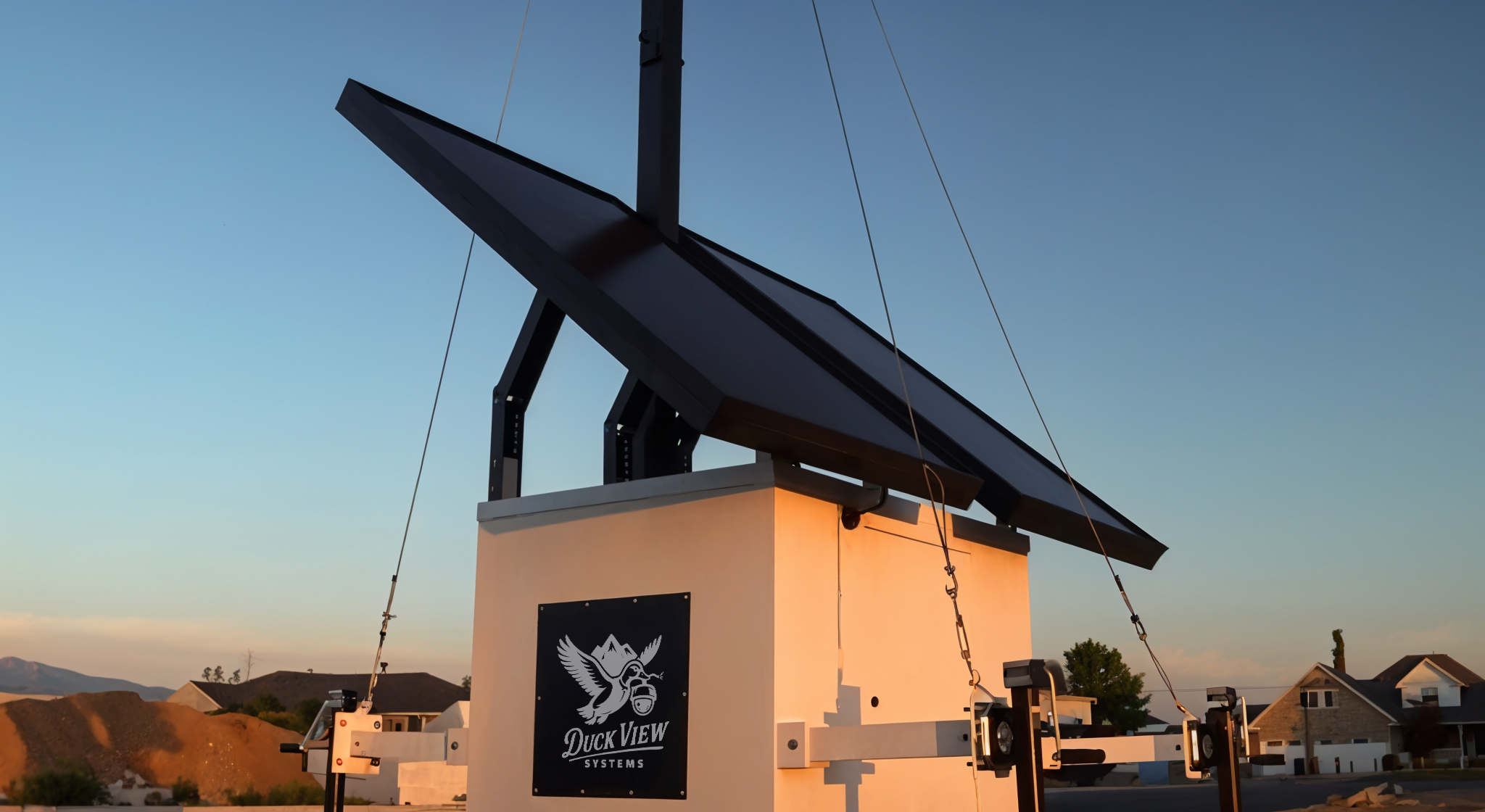 Solar-Powered Construction Site Camera Rental Duck View Systems solar-powered surveillance unit with mast and panels, showcasing advanced construction site camera rental solution