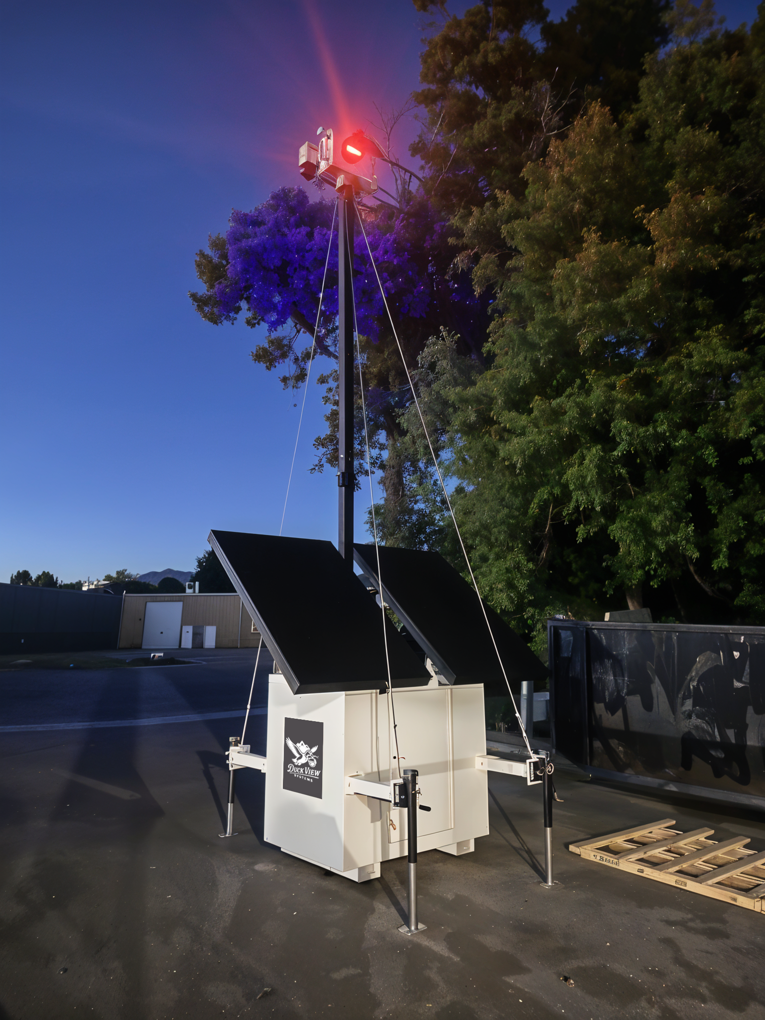 A Duck View Systems mobile surveillance tower with solar panels and cameras designed to deliver instant notifications on site. A Duck View Systems mobile surveillance tower with solar panels and cameras designed to deliver instant notifications on site.